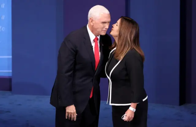 Karen Pence broke the debate's rules by taking off her mask to approach her husband after the event