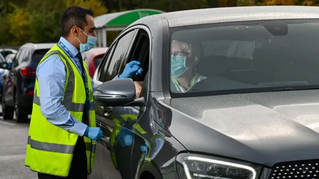 A handout picture of a drive-through flu vaccination centre at Asda