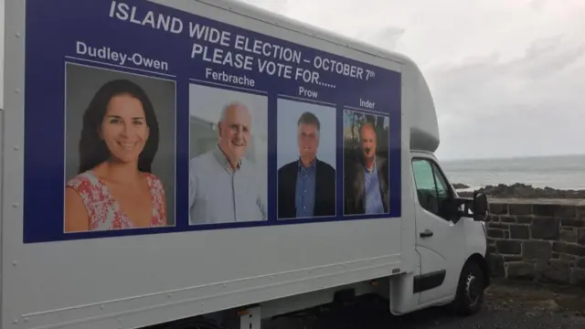 Van with election posters