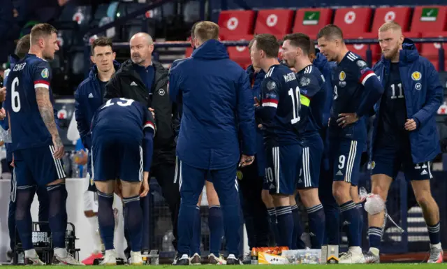 Scotland head coach Steve Clarke talks to his players