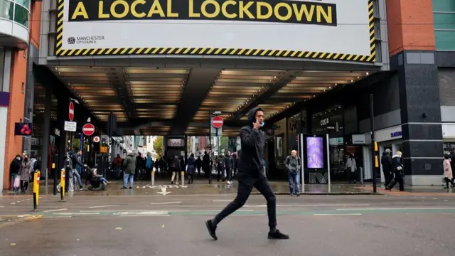 A sign is pictured following the outbreak of the coronavirus disease (COVID-19) in Manchester, Britain October 7, 2020.