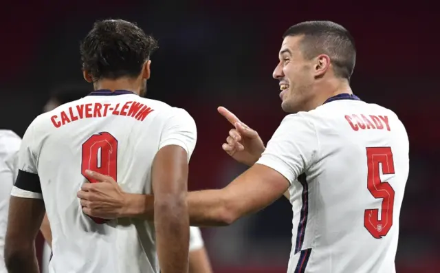 Dominic Calvert-Lewin and Conor Coady celebrate during England's win over Wales