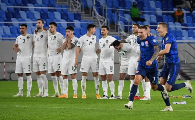 Republic of Ireland players look dejected as they lose on penalties to Slovakia