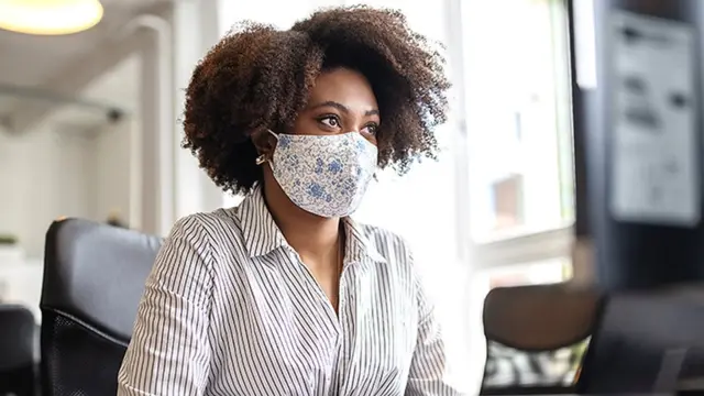 Office worker wearing mask