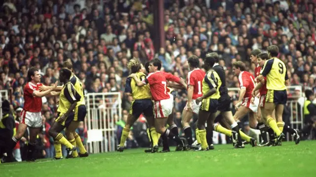 Arsenal and Manchester United players square up in 1990