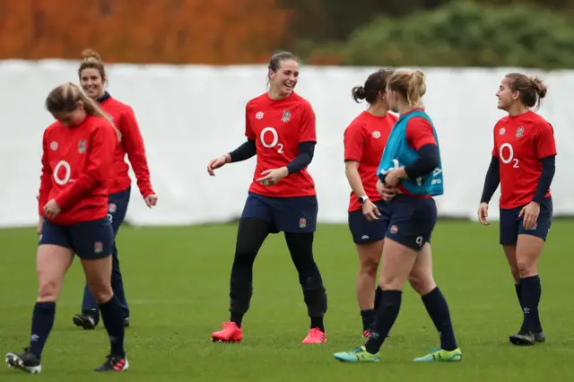 England players laugh during training