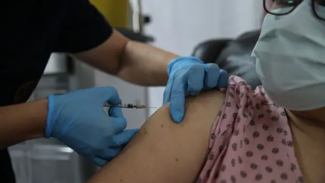 File image of a woman getting a vaccine