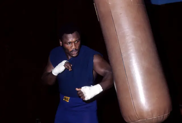 Joe Frazier trains with the punching bag in a gym in Philadelphia, Pennsylvania, October 1973