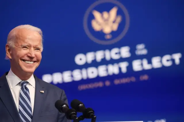 U.S. President-elect Joe Biden smiles as he talks about protecting the Affordable Care Act (ACA) while speaking to reporters about his "plan to expand affordable health care" during an appearance in Wilmington, Delaware, US, November 10, 2020.