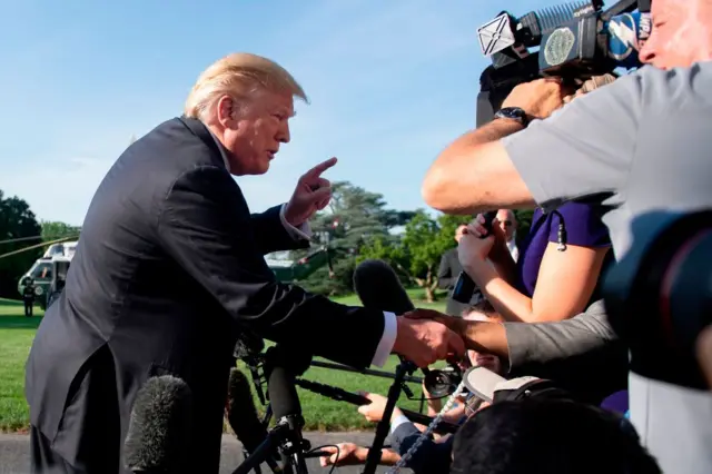 Trump shakes hands with Fox reporter