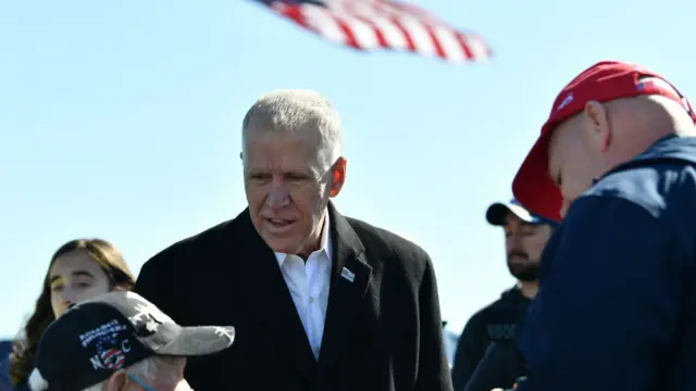 Thom Tillis pictured at a Trump rally on 2 November