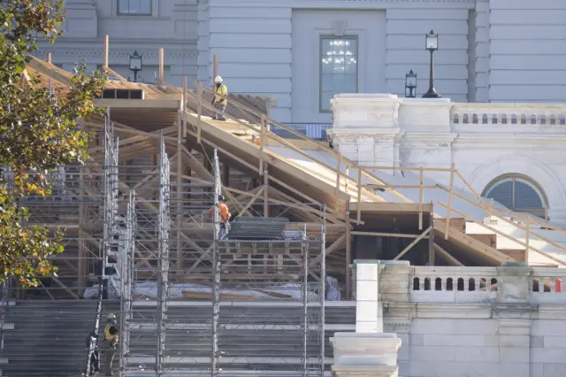 Workers continue construction of the platform and surrounding area for the US Presidential inauguration ceremony, on the West Front of the US Capitol in Washington, DC, USA, 09 November 2020