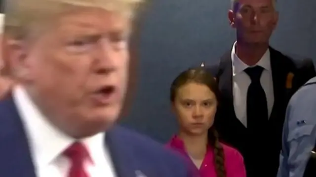 Greta Thunberg (centre) looks as US President Donald Trump (left) enters the UN headquarters in New York in September 2019