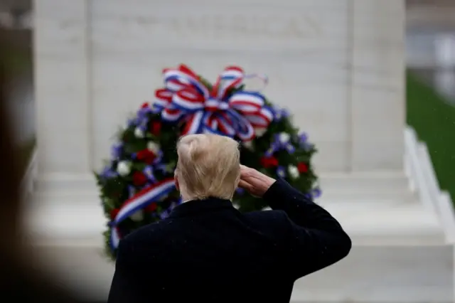trump salutes tomb