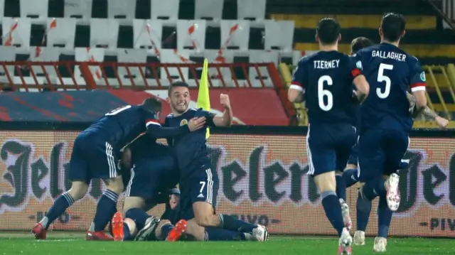 Scotland players celebrate Ryan Christie's goal