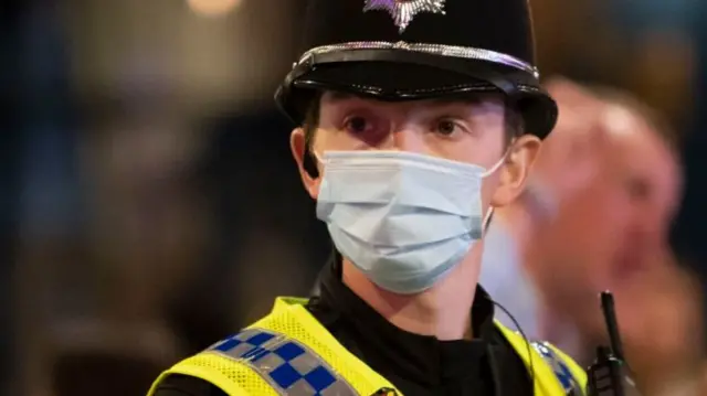 Police officer in mask