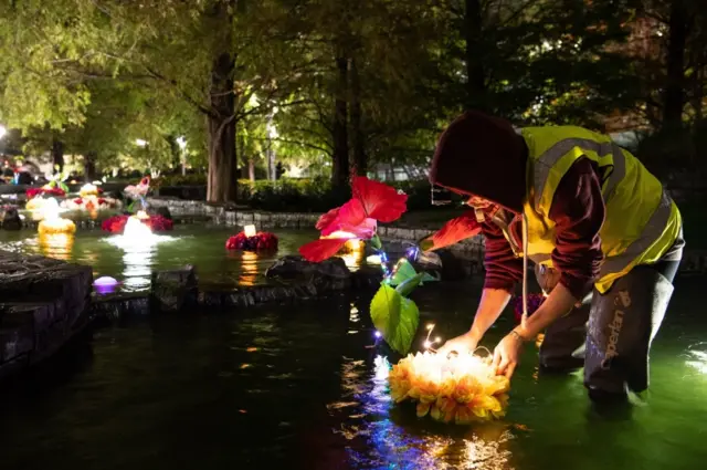 Rangoli-inspired installation made of floating flowers in Canary Wharf