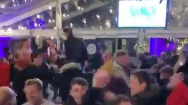 People celebrating at an Aberdeen pub