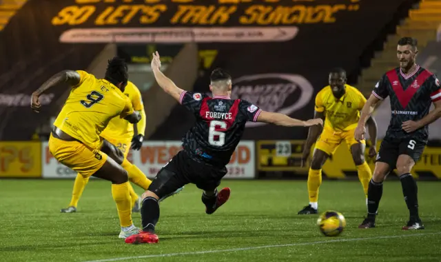 Jay Emmanuel-Thomas fired in two goals for Livingston to get off the mark for the club