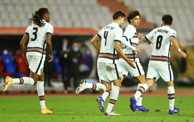 Ruben Dias celebrates