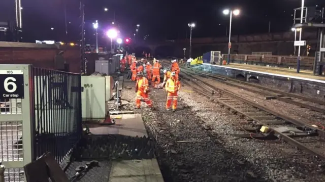 Staff working on the track