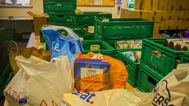 Food in baskets and bags at the food bank