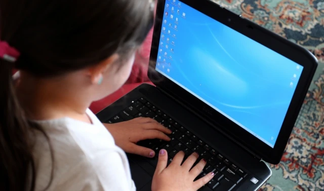 Child using laptop