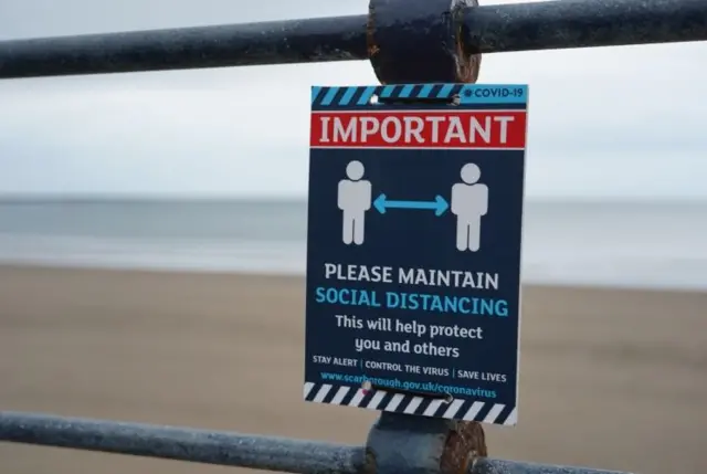 Social distancing sign in Filey