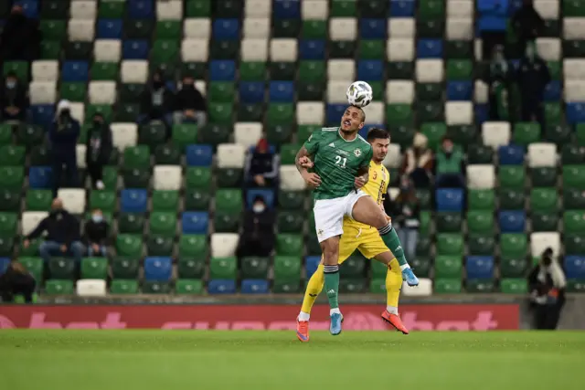 Josh Magennis challenges in the air