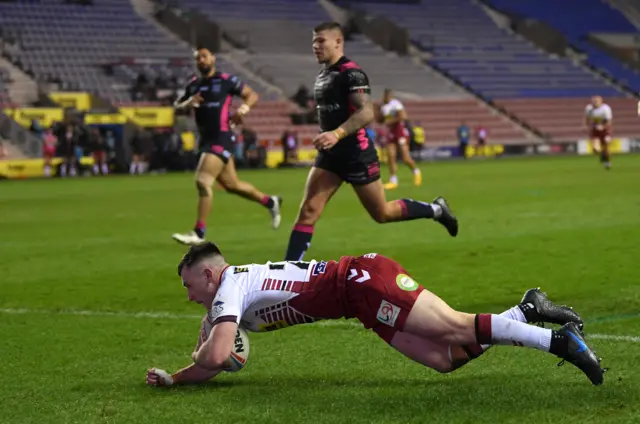 Harry Smith goes over for Wigan's second try