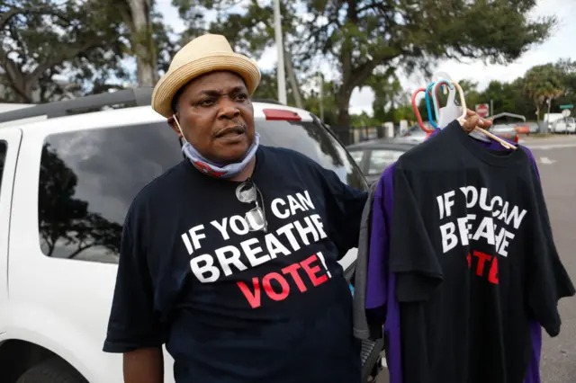 A man sells shirts