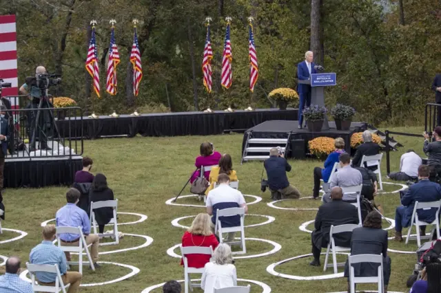 Joe Biden speaks to supporters at a rally at Mountain Top Inn and Resort in Warm Springs, Georgia