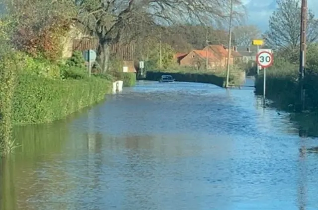 Flooded road in Cattal