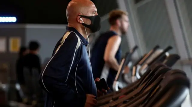 People exercising at a gym after last lockdown eased