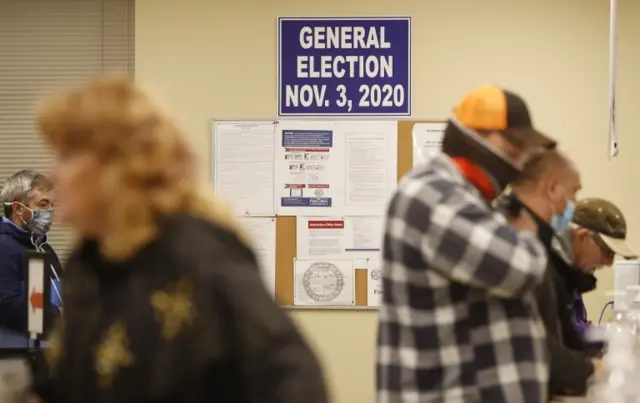 Voters cast their ballots during Ohio's early voting period