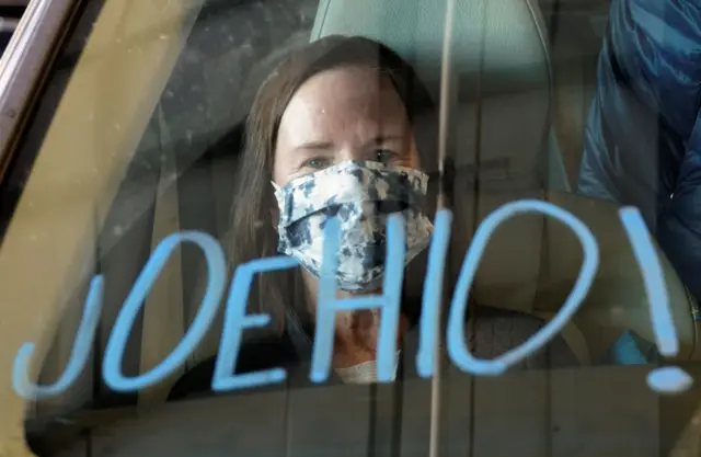 A Joe Biden supporter attends an event in Ohio