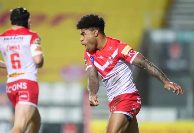 St Helens's Kevin Naiqama celebrates his try against Catalans