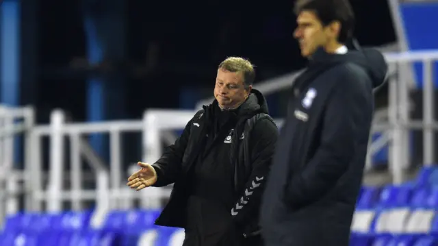 Manager Mark Robins and Aitor Karanka