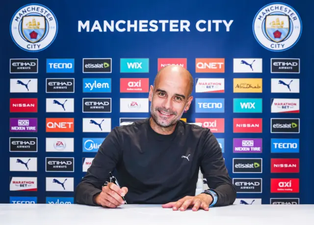 Pep Guardiola signs news deal