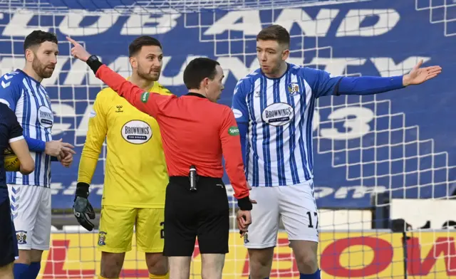 Stuart Findlay pleads his case after being sent off for Kilmarnock