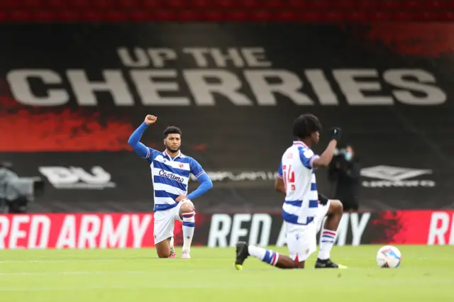 Reading players take a knee