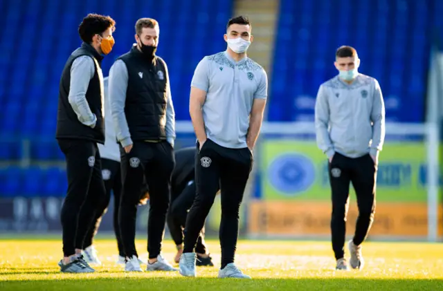 Motherwell players enjoy a stroll across the McDiarmid Park turf