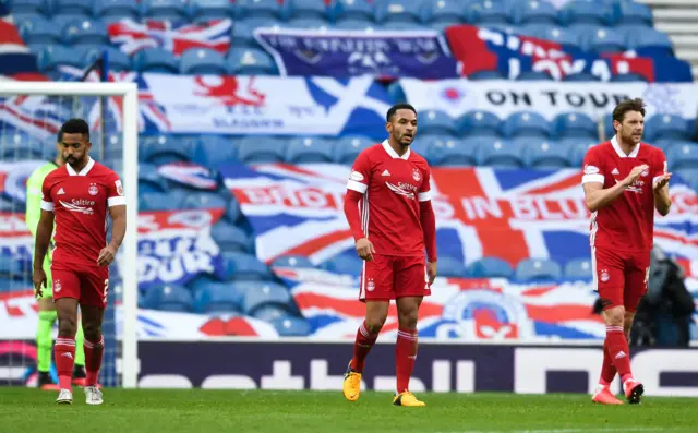 Aberdeen's Shay Logan, Funso Ojo and Ash Taylor