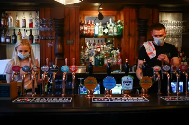 Bar staff in face masks