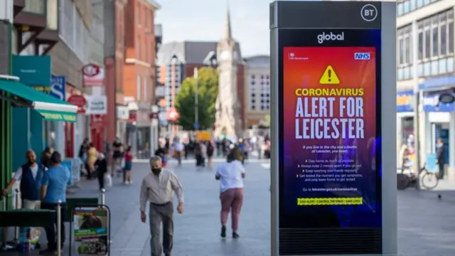 Leicester High Street with coronavirus warnings