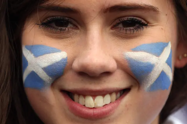 Girl with Scottish flag face paint