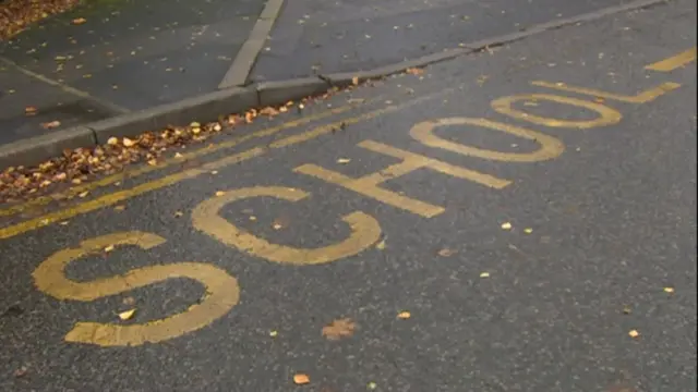 Sign for School on road