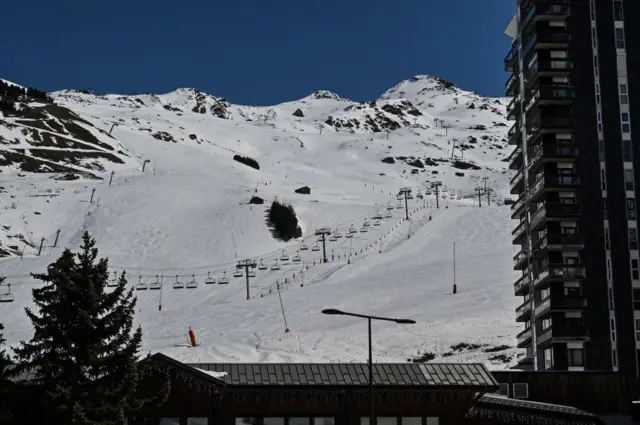 Ski lifts stand idle at the resort of Les Menuires, French Alps, 17 March 2020