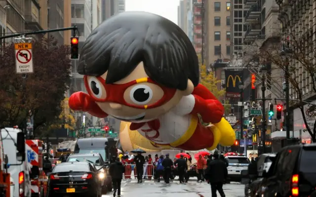 A balloon depicting Red Titan, a character from "Ryan"s World", is seen ahead of the 94th Macy's Thanksgiving Day Parade closed to the spectators in Manhattan, New York City, 26 November 2020