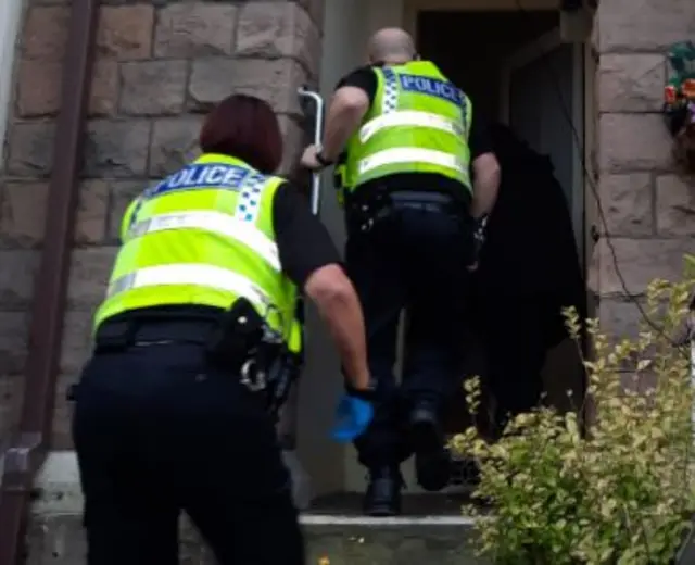 South Yorkshire Police enter house